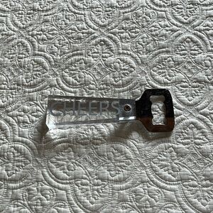 Oversized bottle opener.